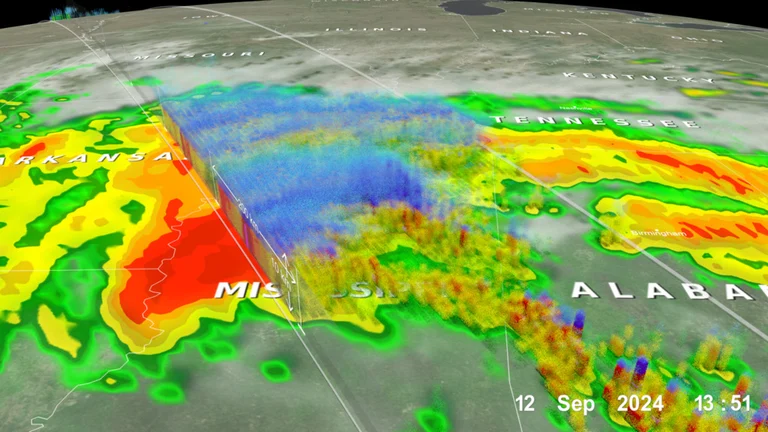 Storm radar over the Alabama and Mississippi Gulf Coast at landfall — the flooding that displaces rodents and reseeds mosquito habitat around Mobile