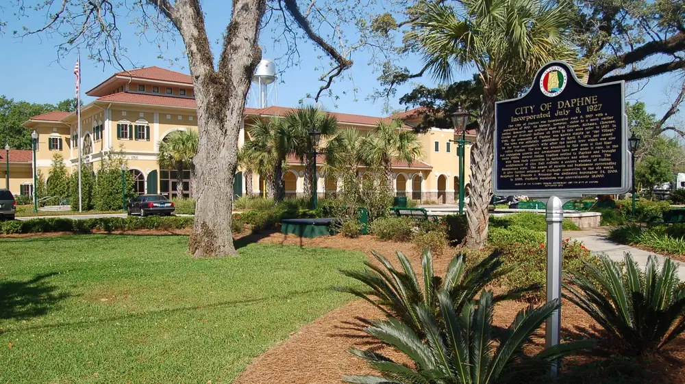 City marker and live oaks in Daphne, Alabama, on the Eastern Shore of Mobile Bay