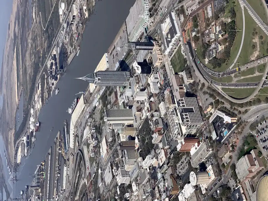 Aerial view of downtown Mobile, Alabama skyline and Mobile Bay waterfront, the coastal Gulf Coast city served by licensed local pest control operators